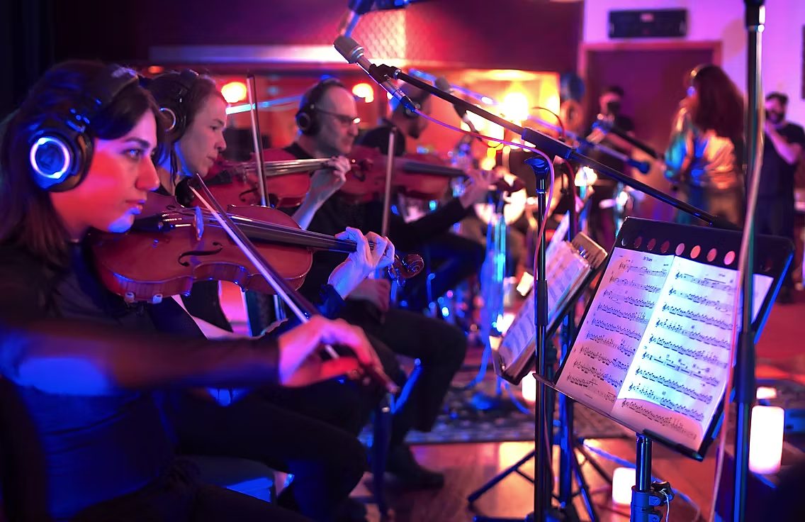 Strings performing in the studio